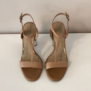 Tan sandals with metallic heels